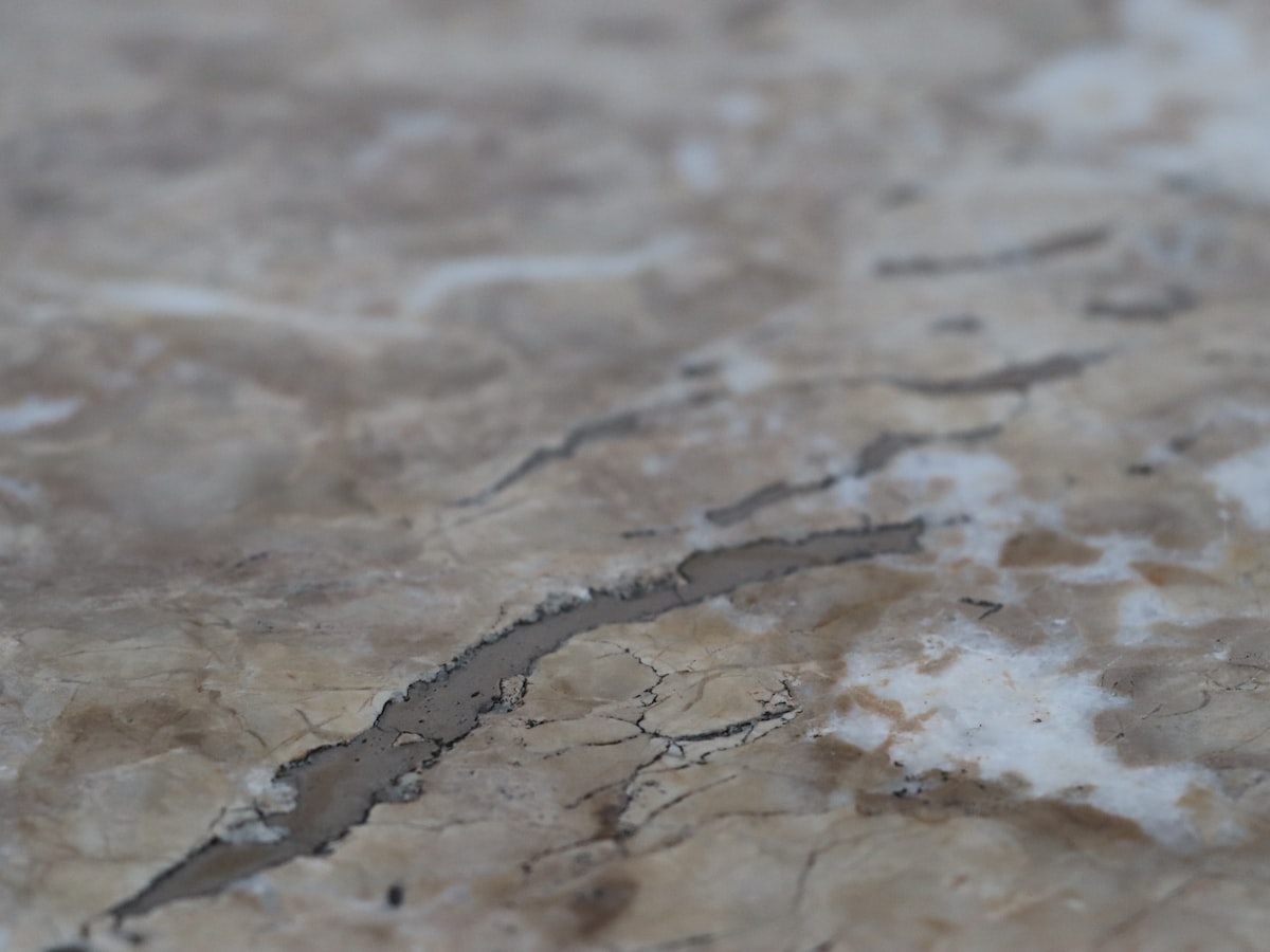 Close-up of a natural stone slab at the Pacific Range Counter Top fabrication shop