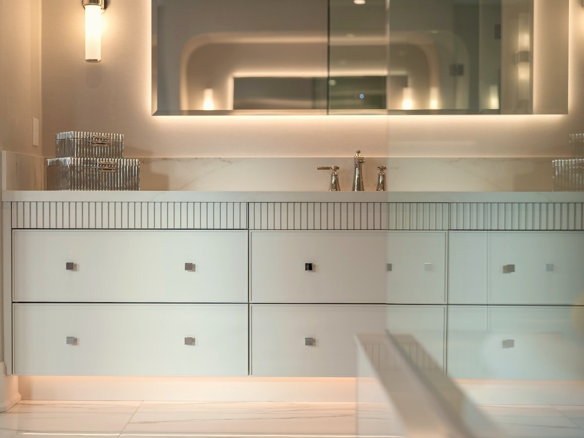 Pacific Range installers setting a quartz countertop into place